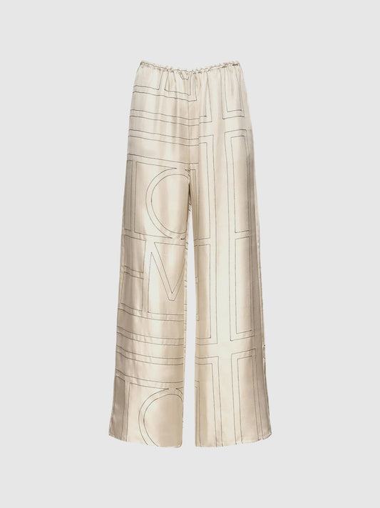 Monogram embroidered silk pants