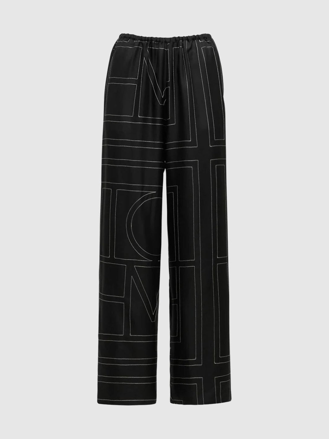 Monogram embroidered black silk pants